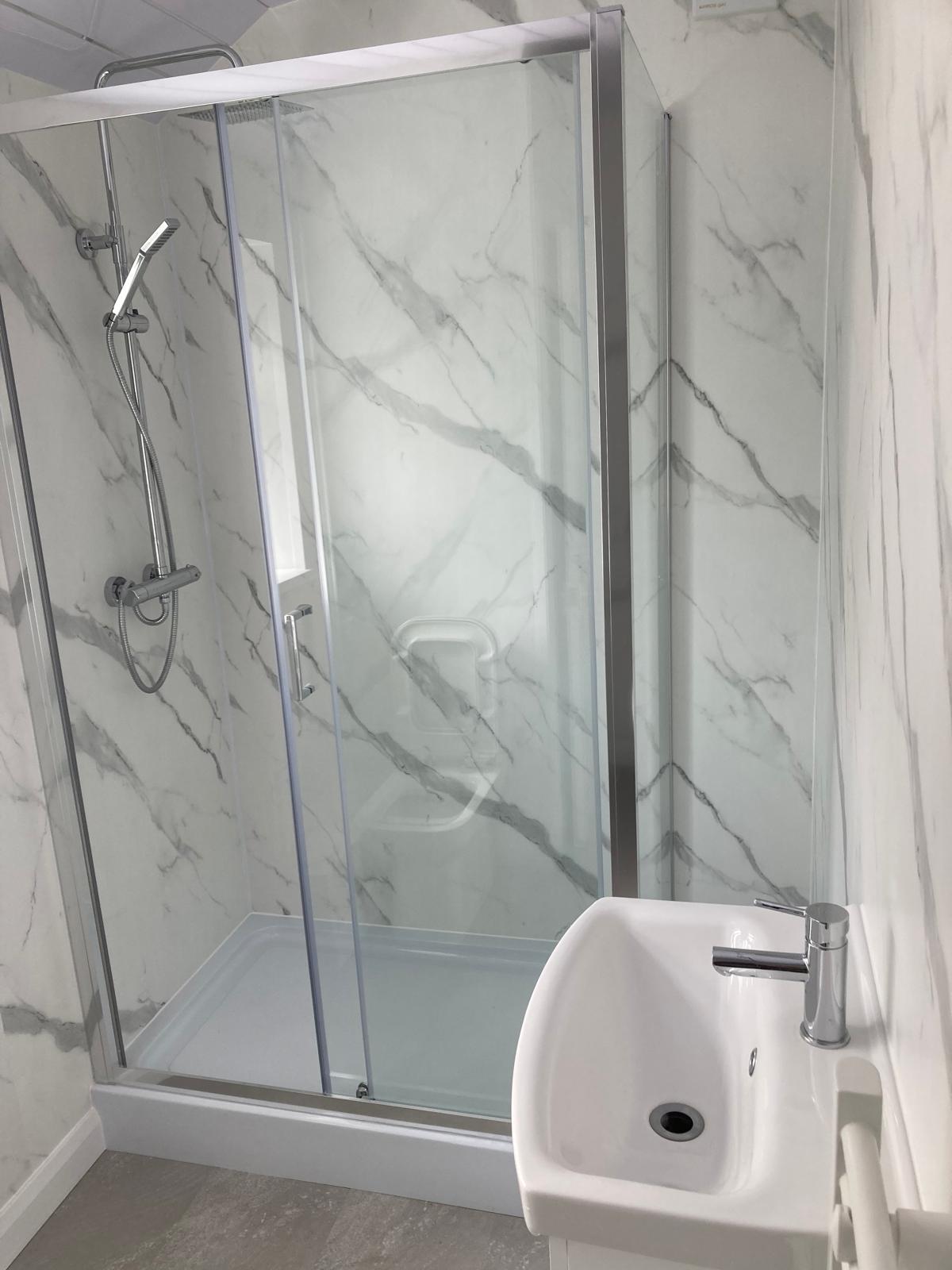 Bathroom fitting by VW Building Services